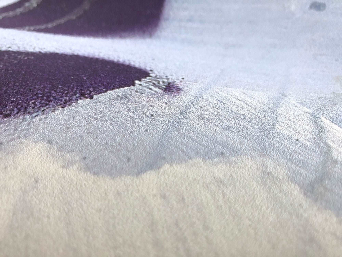 Macro close-up of the Follow the Sun wallpaper by Hannah Chloe, highlighting soft layered brushstrokes in muted lilac, warm white, and sun-washed neutral tones.