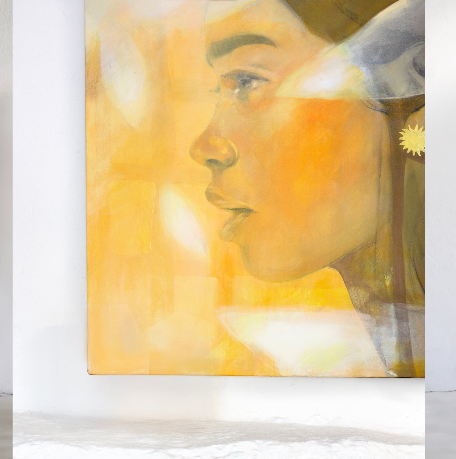 Original contemporary painting of a woman in warm yellow and ochre tones, painted with soft layers and expressive brushwork.