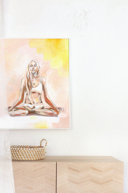 Bohemian interior with a yoga artwork. Lotus pose mediation in yellow and pink.