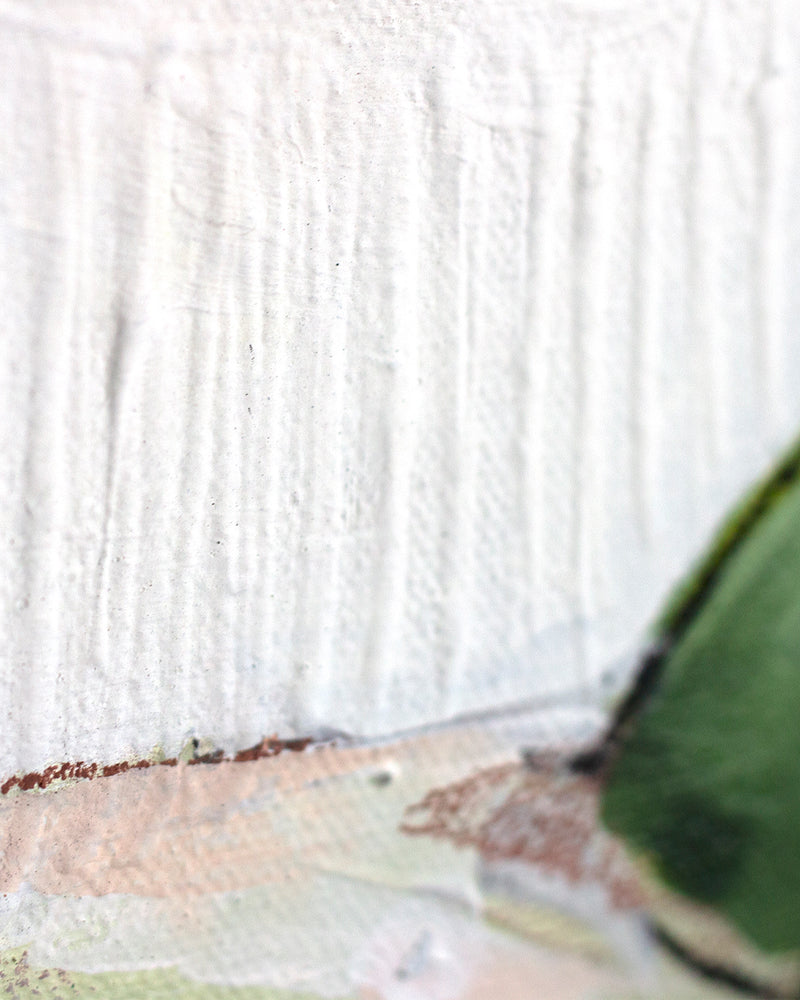 Close up art detail with the texture of teh painting in white.