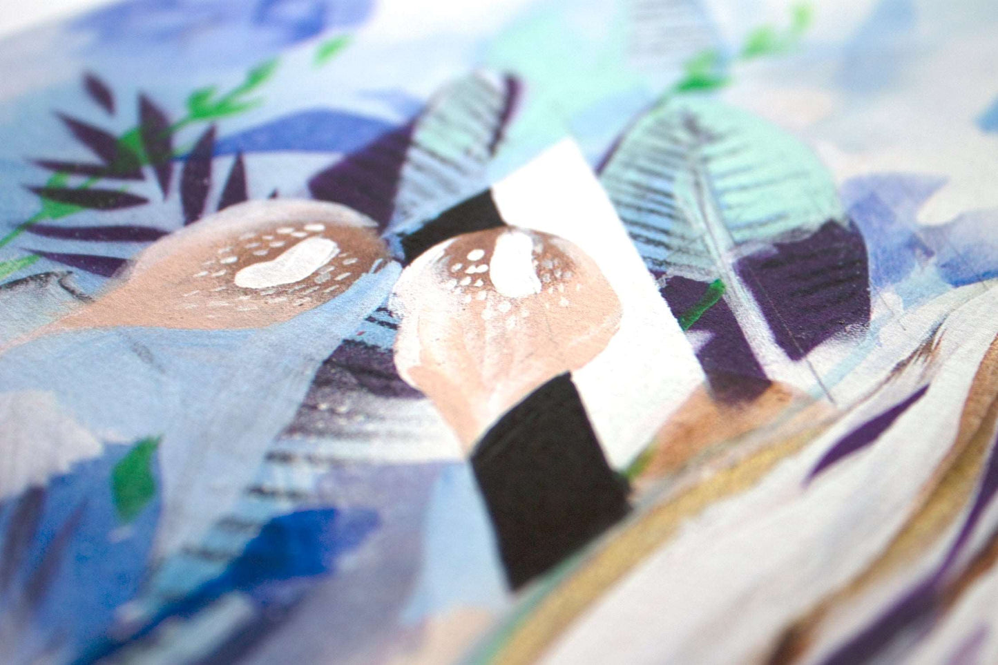 Close up detail of art print of flowers and geometric lines in a blue natural background.