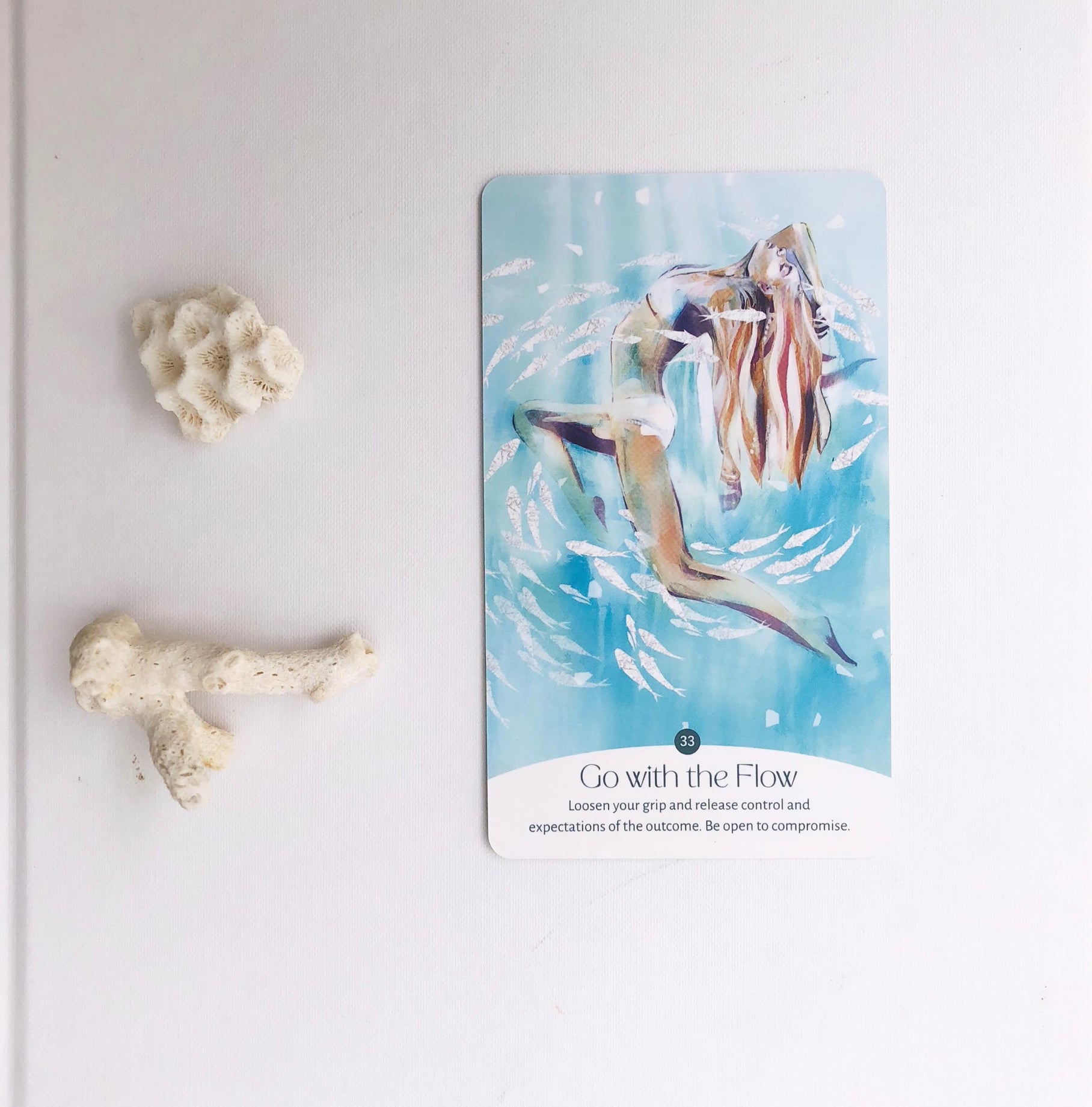 Go With the Flow oracle card from the Golden Keys of Gaia deck featuring flowing feminine figure and water-inspired elemental artwork
