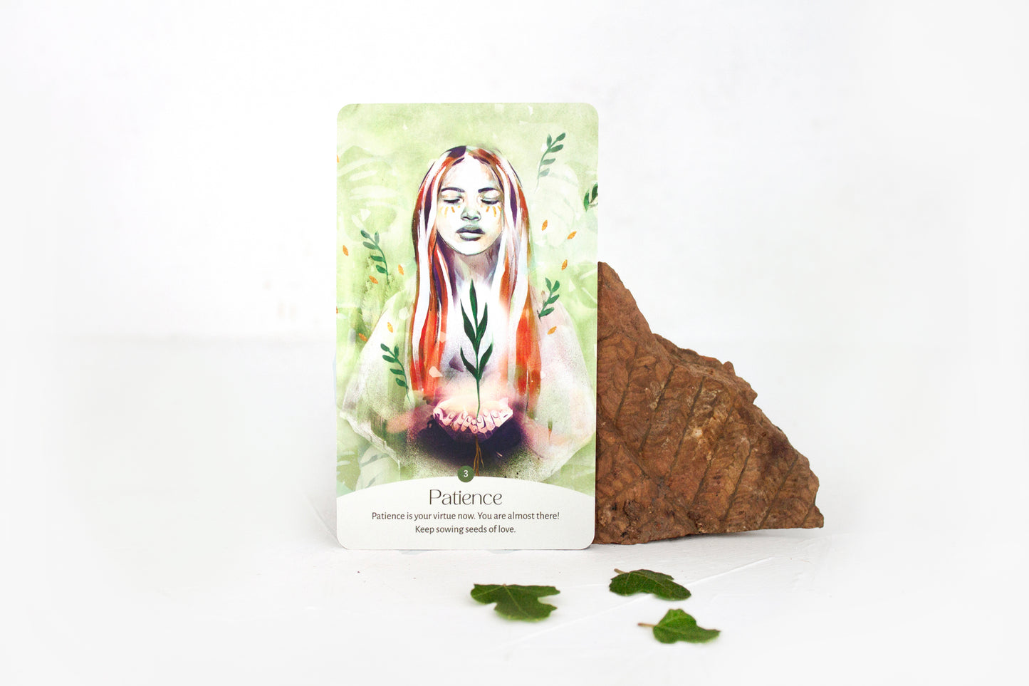 Patience oracle card from the Golden Keys of Gaia deck featuring feminine, nature-inspired artwork symbolising growth and earth wisdom